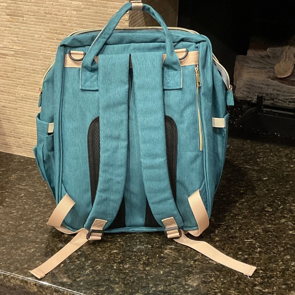 Land Traveling Share Backpack Teal